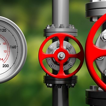 industrial-manometer-pipelines-and-valves-on-blur-pwbempf.jpg